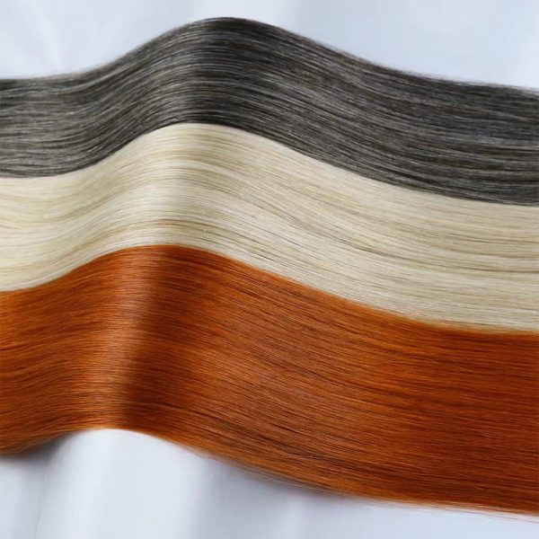 Tape-In-Hair-Extensions-in-Orange-Color-350-7